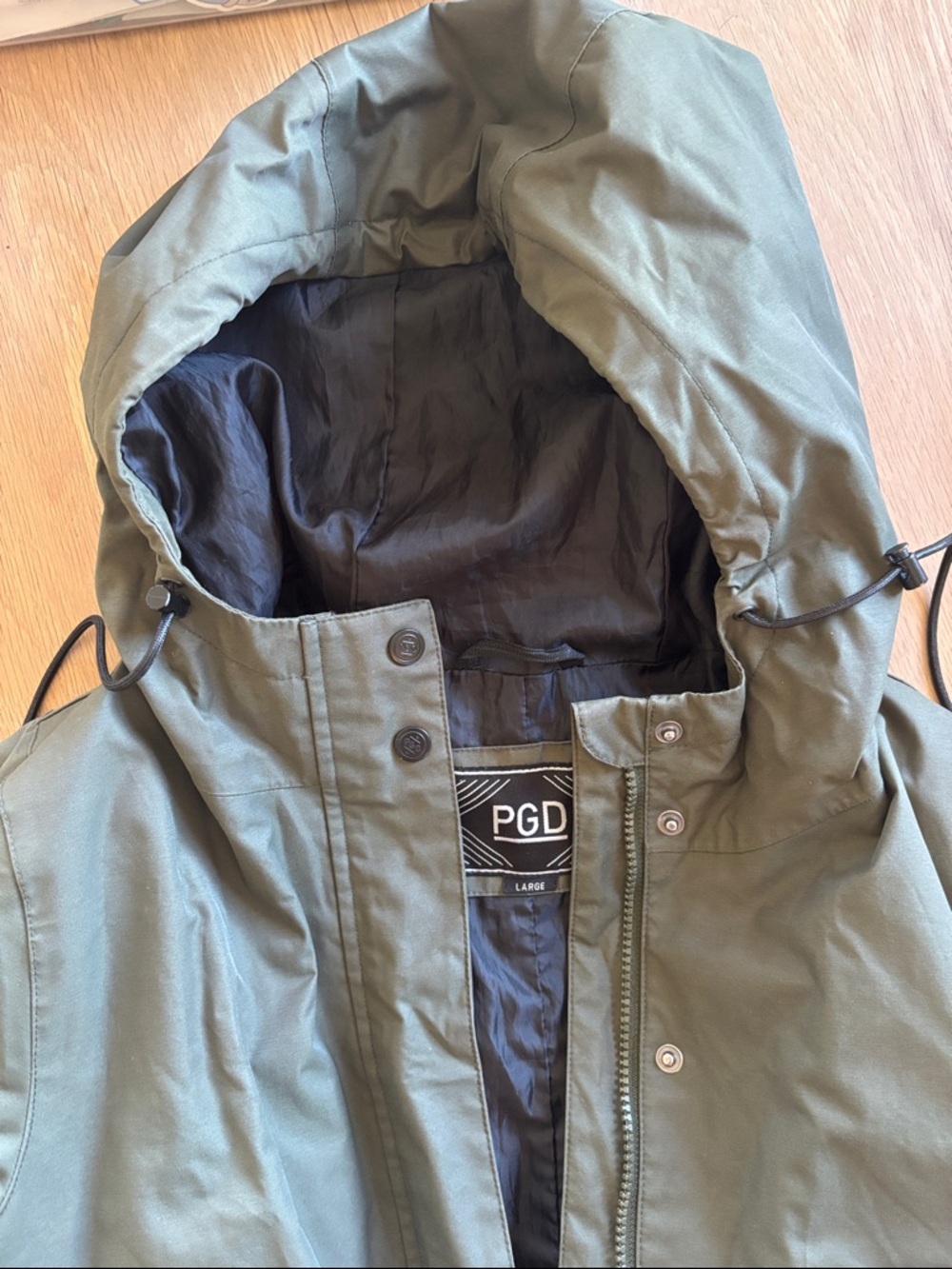 Women’s Olive rain jacket